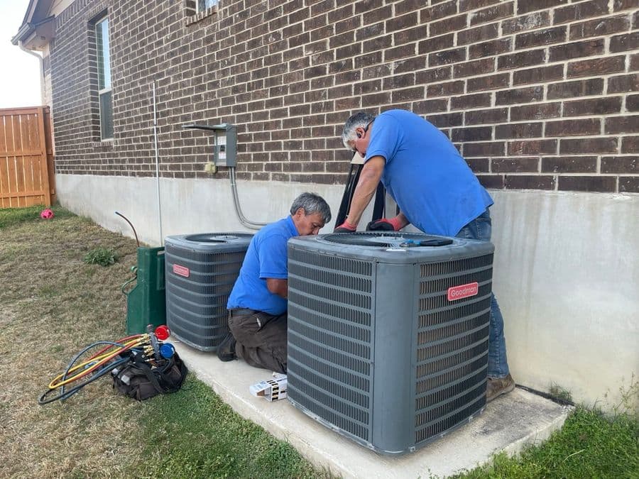 Owner of a San Antonio HVAC company standing outside a job site