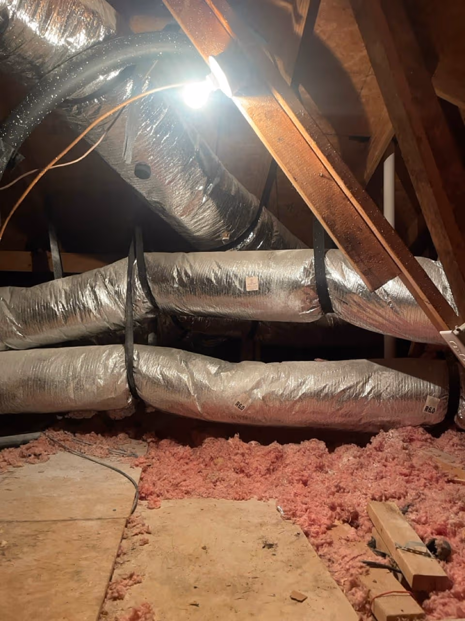 Newly installed sealed attic ductwork in a San Antonio home
